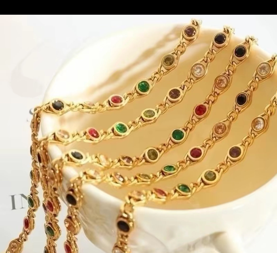 Jewelry Set Gold-Toned Necklace and Bracelet with Colorful Accents Featuring Red-Green & Black Stones